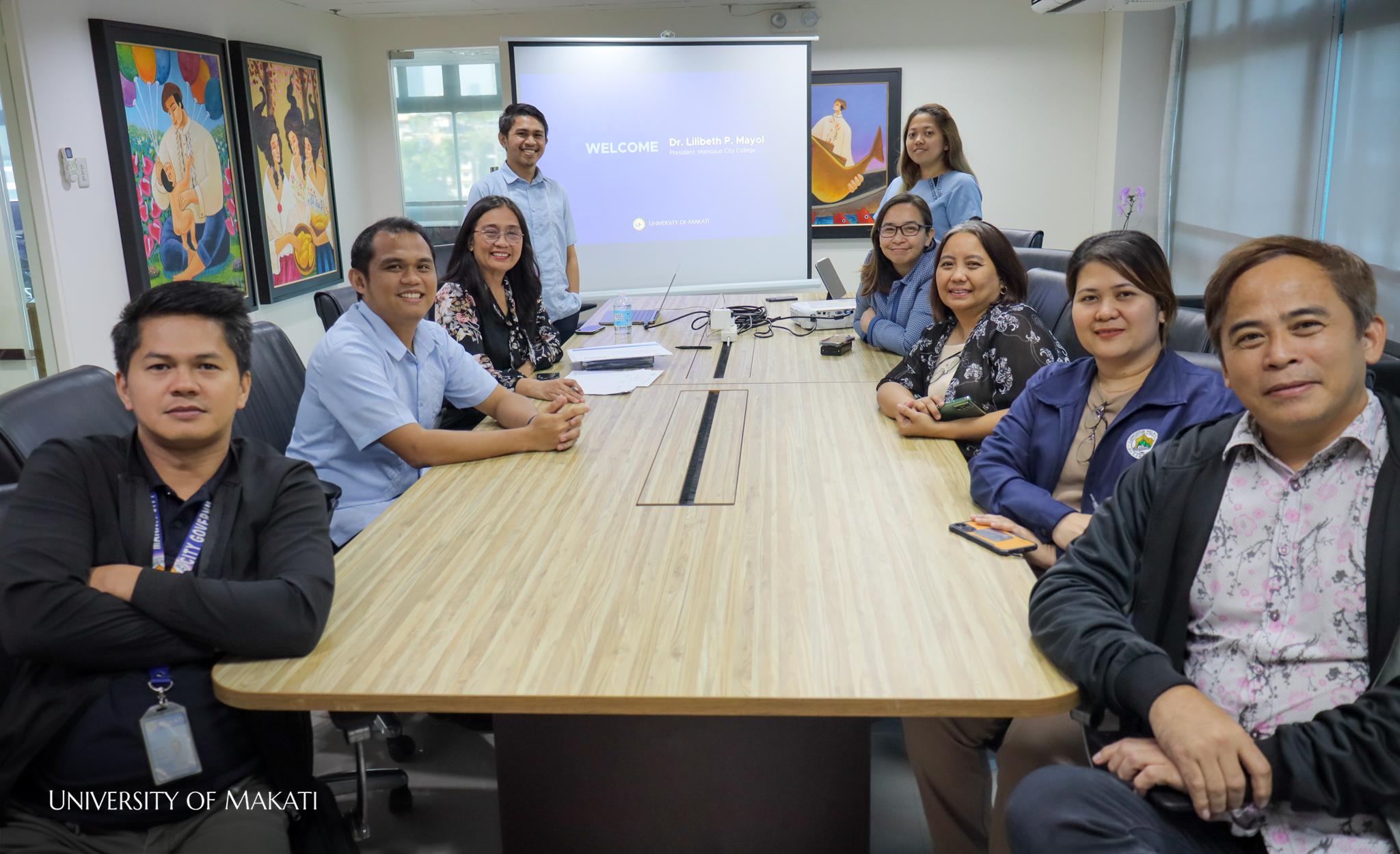 Umak Library Mandaue City College's President personally benchmarks with UMak